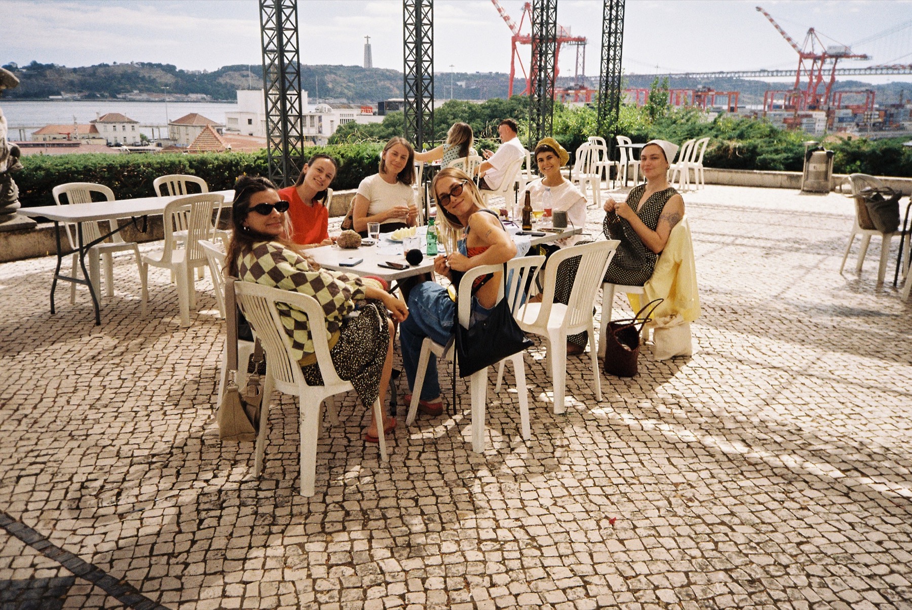 A crochet community gathering together outdoors